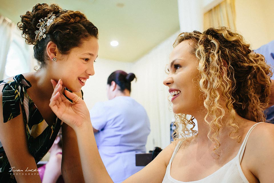 Bride and daughter having an intimate moment during getting ready stage